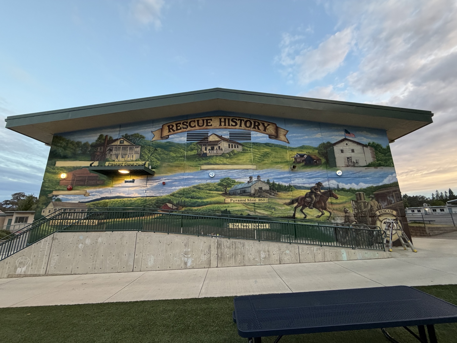 Exterior community history mural in Rescue California