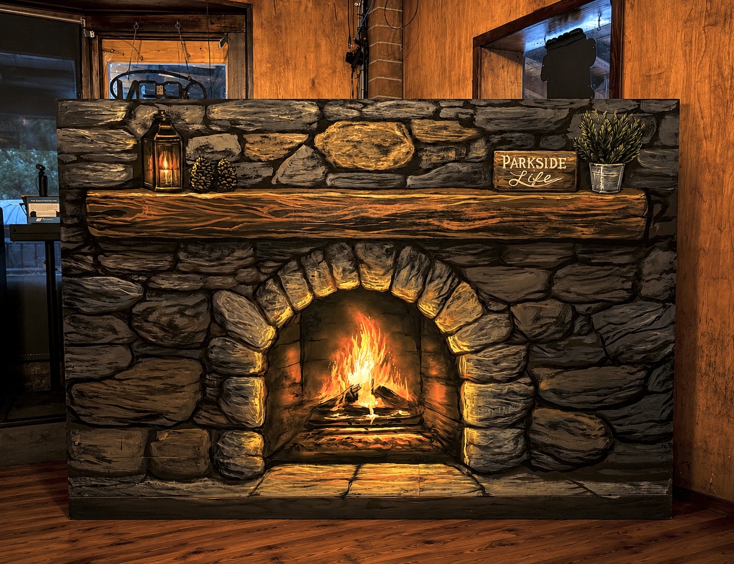 Hand-painted stone fireplace illusion mural