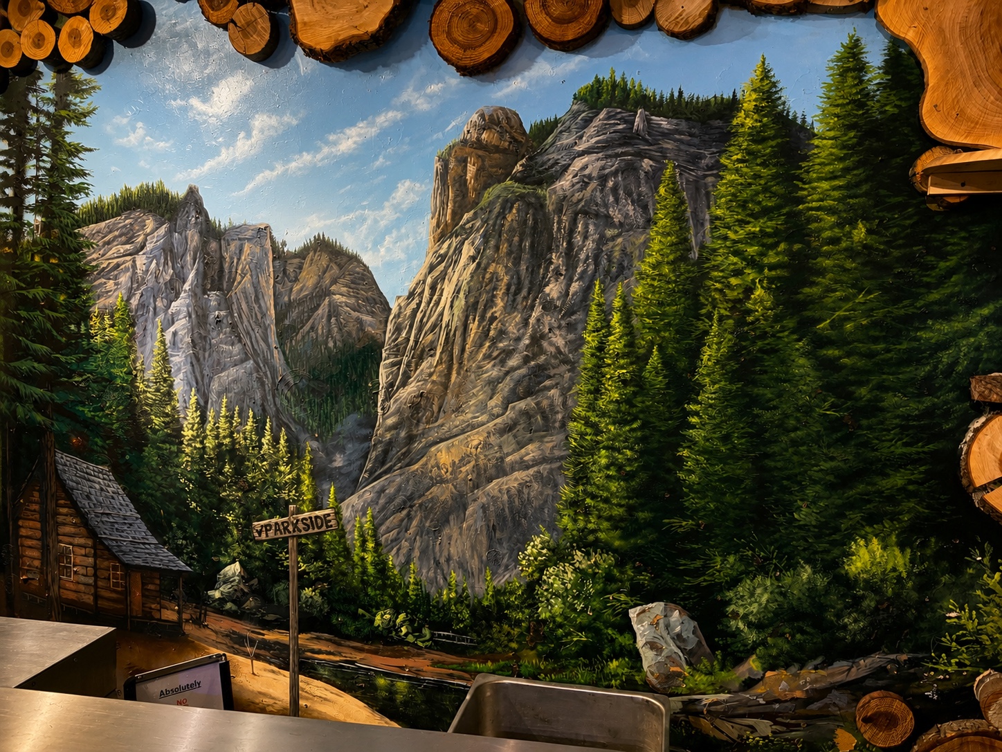 Yosemite mountain landscape mural in a rustic lodge